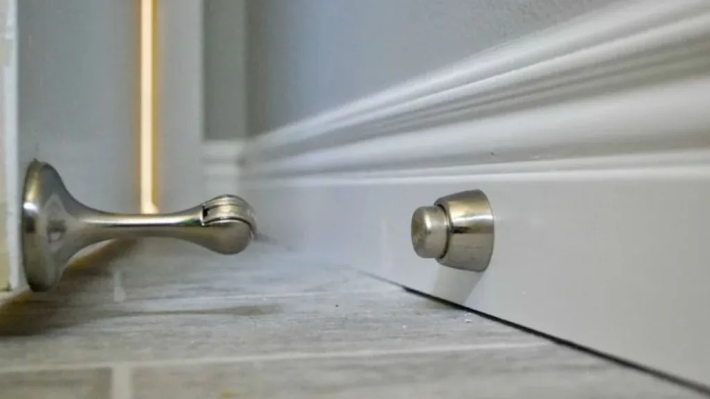 wall-mounted door stopper for homes
